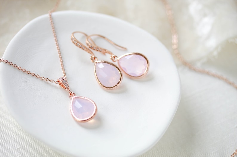 Rose gold necklace and earrings set with ice pink gemstone