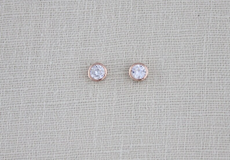 0.18 CT. T.W. Diamond Cross Stud Earrings In 14K White Gold | Peoples