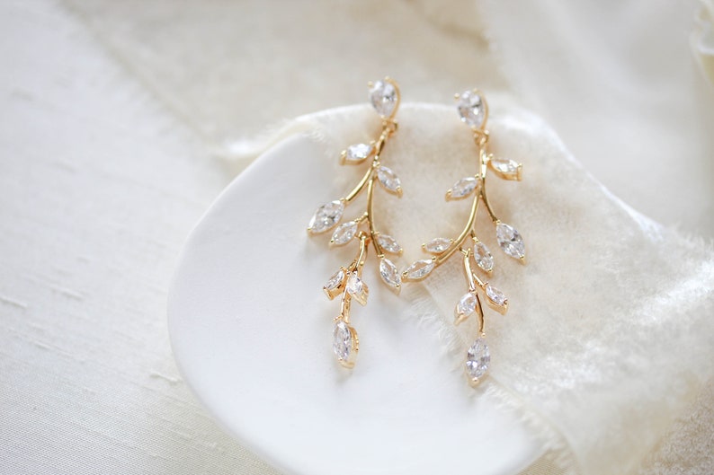 Long gold cubic zirconia vine earrings