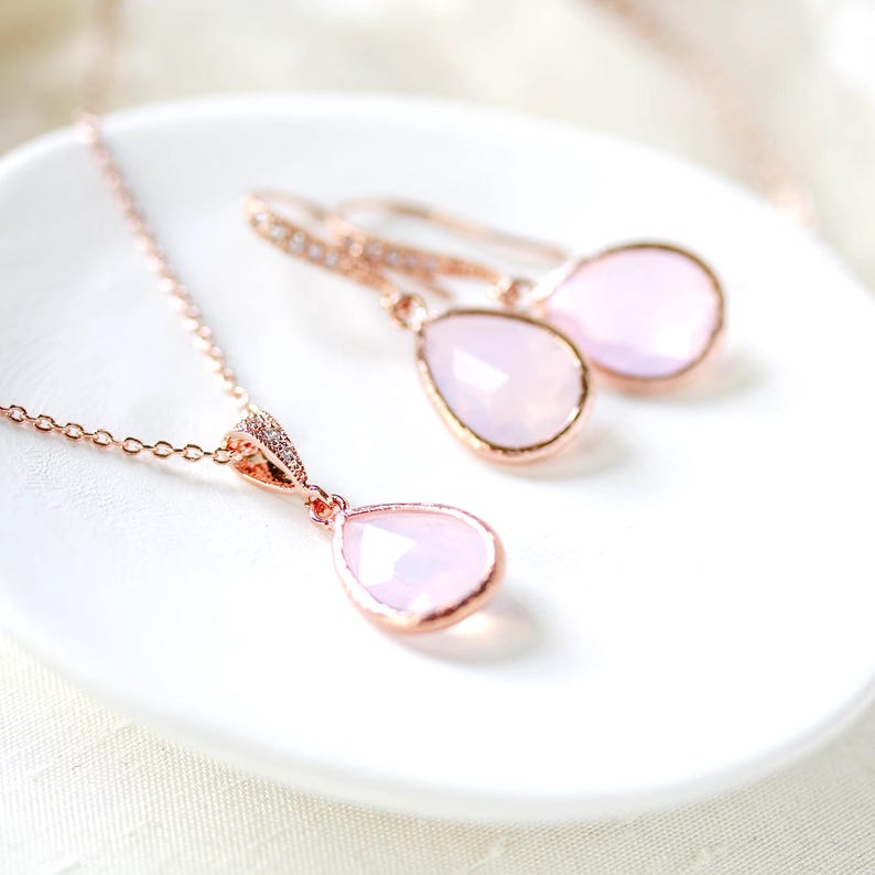 Rose gold necklace and earrings set with ice pink gemstone