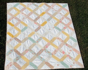 Lap quilt featuring Paris Flea Market fabric by Moda