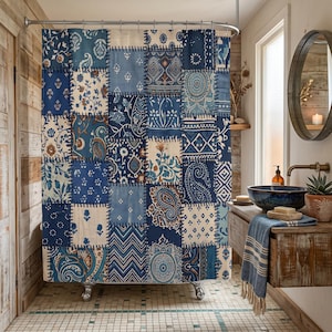 May include: A shower curtain featuring a patchwork design of various blue and white fabric squares. Each square displays distinct patterns including paisley, floral, geometric, and dotted motifs, all connected by visible dark blue stitching lines.