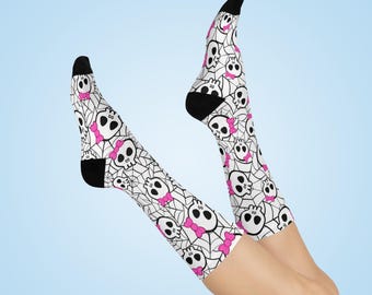 May include: A pair of white knee-high socks with a black and pink skull and spiderweb pattern.
