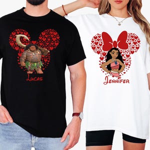a man and a woman wearing disney shirts