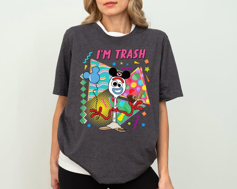 a woman wearing a t - shirt that says i'm trash