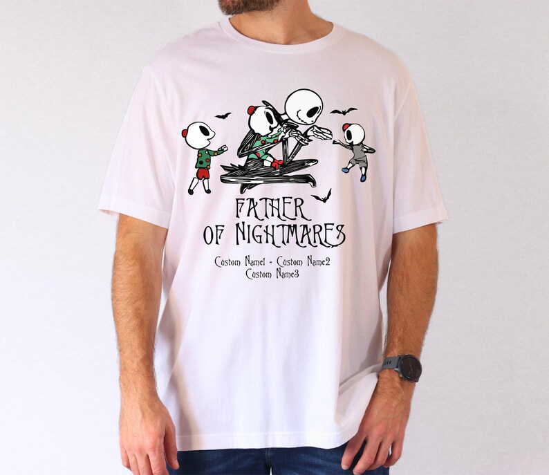 a man wearing a white t - shirt that says father of nightmares