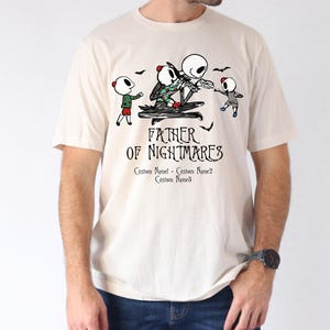 a man wearing a t - shirt that says father of nightmares