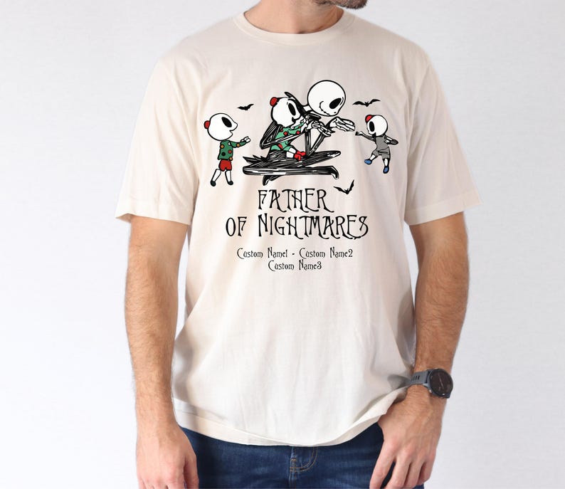 a man wearing a t - shirt that says father of nightmares