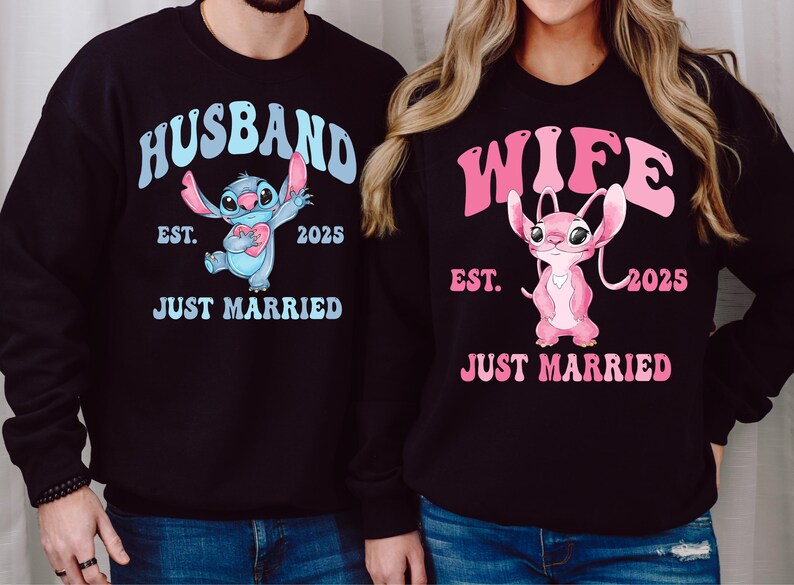 a man and a woman wearing husband and wife sweatshirts