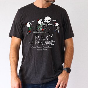 a man wearing a t - shirt that says father of nightmares