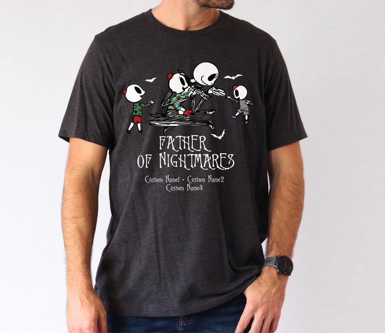 a man wearing a t - shirt that says father of nightmares
