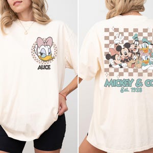 Camiseta xadrez da Disney com margaridas, camiseta da viagem em família da Disney 2025, camiseta da viagem das meninas da Disney WDW, camiseta de férias da Disneylândia, camiseta do Magic Kingdom