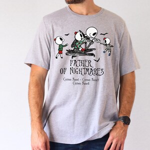 a man wearing a t - shirt that says father of nightmares