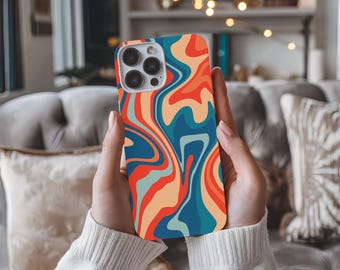 May include: A phone case with a colorful abstract design featuring swirls of blue, orange, red, and yellow. The case is made for a phone with a camera bump.