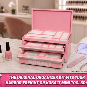 May include: Pink Kobalt mini toolbox with multiple compartments and drawers, ideal for organizing nail supplies. Includes nail polish bottles, a UV lamp, nail file, and clippers. The text at the bottom reads: "THE ORIGINAL ORGANIZER KIT FITS YOUR HARBOR FREIGHT OR KOBALT MINI TOOLBOX."