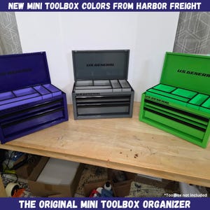 May include: Three mini toolboxes in purple, gray, and green, with the text "NEW MINI TOOLBOX COLORS FROM HARBOR FREIGHT" and "THE ORIGINAL MINI TOOLBOX ORGANIZER". Each toolbox is open, revealing interior compartments. The brand name "US GENERAL" is visible on each.