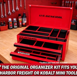May include: A red U.S. General mini toolbox with black interior compartments and drawers. The open toolbox displays the text "U.S. GENERAL". The bottom of the image has the text "THE ORIGINAL ORGANIZER KIT FITS YOUR HARBOR FREIGHT OR KOBALT MINI TOOLBOX".