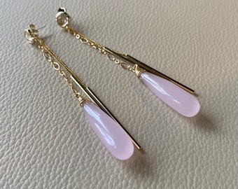 Pink quartz gold earrings. Ear jackets.  Bar post earrings. Gold and silvers smooth rose quartz teardrop earrings.