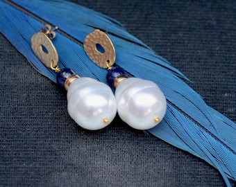 Large white pearl lapis lazuli earrings. Gold plated post earrings. Navy blue  and faux pearl earrings.