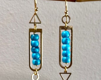 Turquoise geometric brass earrings.  Long abstract earrings. Hammered brass statement modern gold tone earrings. Jewelry trend.