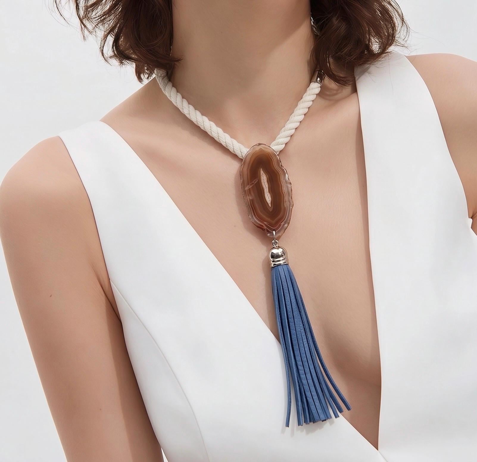 Red agate slice blue leather tassel necklace. Large agate pendant on a twisted cotton rope.