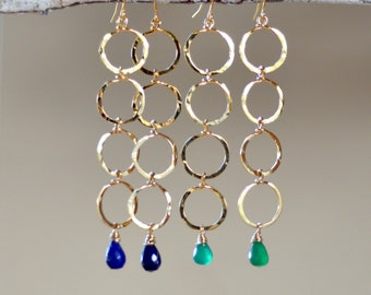 Green onyx gold circle earrings. Gemstone teardrop earrings. Four rings long earrings.