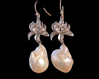Baroque white pearl silver earrings. Large ivory free form baroque pearl flower earrings.  Sculptural statement earrings.