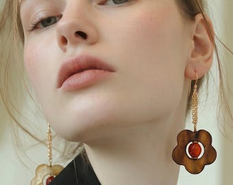 Large mother of pearl floral earrings. Flower MOP on gold chain earrings.