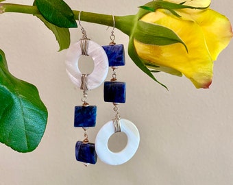 Mother of pearl hoops, sodalite silver earrings. Mismatched white  and dark blue earrings. Large sterling silver asymmetrical earrings.