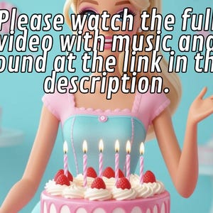 May include: A doll wearing a pink and blue dress, with a birthday cake in front of her. The cake is pink with white frosting, strawberries, and lit candles. Text on the image reads: "Please watch the full video with music and sound at the link in the description."