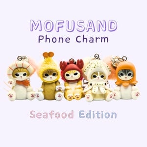 May include: Five adorable cat phone charms from the "MOFUSAND Seafood Edition" collection. Each cat is dressed in a different seafood-themed costume, including a shrimp, crab, squid, and more. The charms are white, orange, yellow, and red.