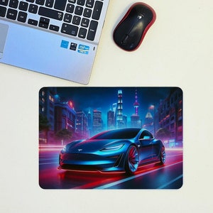 May include: A blue electric car drives through a city at night. The car has red neon lights underneath and a glowing blue interior. The city skyline is visible in the background.
