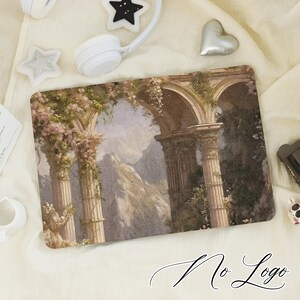 May include: Rectangular decorative mat featuring a classical landscape painting with columns, arches, and floral accents. The artwork depicts a mountain scene with a soft color palette of beige, pink, and green. The words "No Logo" are written in cursive.