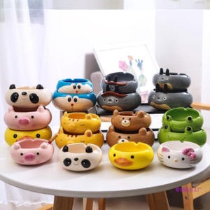 Schattige cartoon dierenasbakken – Keramische asbakcollectie met gezichten van panda, kikker, kat, varken en beren – Leuke rookaccessoires en woondecoratie