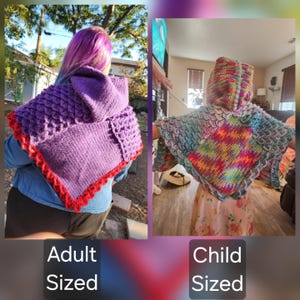 May include: Two hooded capes are shown, one adult-sized and one child-sized. The adult cape is purple with a red scalloped edge. The child's cape is multi-coloured with a rainbow pattern. Both capes feature a dragon scale design.