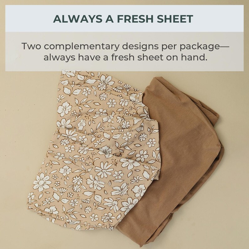 Peut inclure: Un ensemble de draps pli&eacute;s. L'un des draps pr&eacute;sente un motif floral beige avec des fleurs blanches et des tiges marron. L'autre drap est de couleur unie beige. Le texte "ALWAYS A FRESH SHEET" est en haut de l'image.