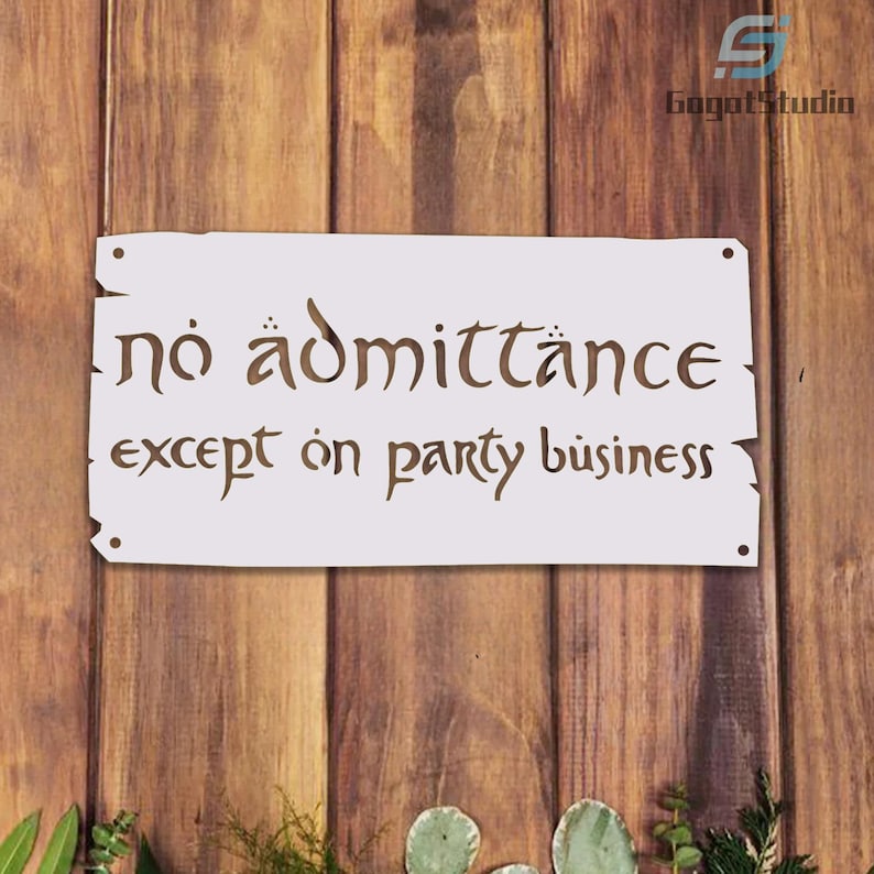 May include: A rectangular white sign with the words "No admittance except on party business" in a stylized font. The sign is mounted on a wooden background with a natural wood grain.