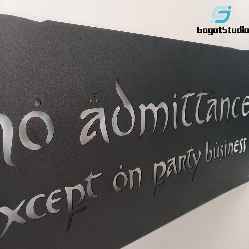 May include: Black metal sign with cut-out lettering that reads "No admittance except on party business." The sign has a matte finish and is mounted on a white wall. The GogotStudio logo is in the upper right corner.
