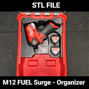 May include: Red Milwaukee M12 FUEL Surge impact driver with two batteries in a red plastic carrying case. STL FILE.