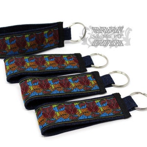 Red Owl Mola-like Jacquard Ribbon Keychain with Denim