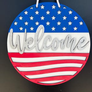 Patriotic Welcome Sign | 12” 3D Laser Cut American Flag Round | Rustic Red, White & Blue Door Hanger | 4th of July Porch Decor