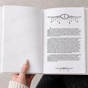 May include: An open book with white pages featuring black printed text and decorative chapter headers. The right page displays a large number one inside an ornate frame with hanging elements, followed by paragraphs of Latin placeholder text.
