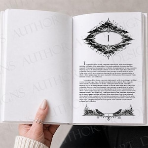 May include: An open book with white pages featuring black ink illustrations. The right page displays a decorative chapter header with the number 1 inside an oval frame, followed by printed text and a footer graphic featuring two birds.