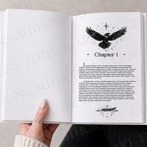May include: An open book with white pages featuring black ink illustrations. The right page displays the text Chapter 1, a flying raven graphic, and a feather icon, surrounded by stars and celestial symbols. The left page is blank.
