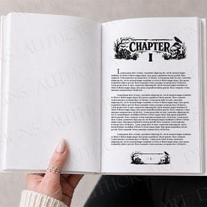 May include: An open book with white pages featuring black printed text. The right page displays a chapter heading with a graphic illustration of a skull, a raven, and a house, followed by paragraphs of text and a decorative footer element.