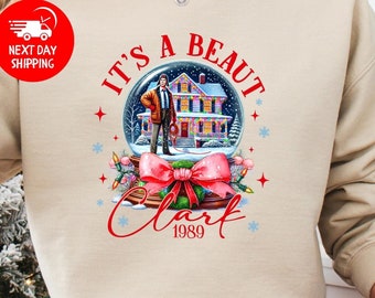 It's A Beaut Clark Christmas Sweatshirt, Funny Christmas Shirt for Women, Pink Snow Globe Christmas Movies Shirt,Preppy Xmas Gift,90's Movie