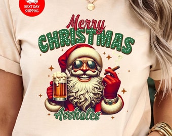 Merry Christmas Assholes T-Shirt, Santa Claus Middle Finger Tee, Funny Xmas Gift for Him, Santa Smoke T-Shirt, Holiday Humor Gift Idea