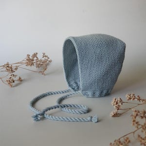 Hand-Knitted Newborn Baby Bonnet - hat from Oeko-Tex Merino wool yarn in aqua blue color