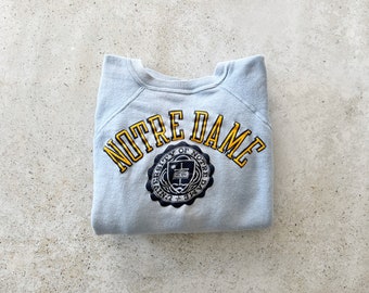 Vintage Sweatshirt | NOTRE DAME University College 70’s Raglan Pullover Top Shirt Sweater Light Blue | Size XS/S