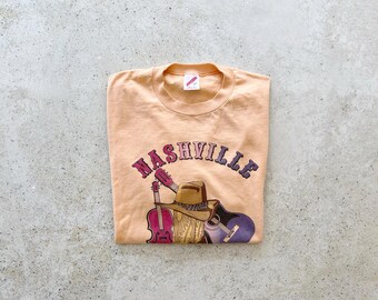 Vintage T-Shirt | NASHVILLE Tennessee Music City Country Rock Graphic Tee Shirt Top Pullover 90’s Peach  | Size M/L